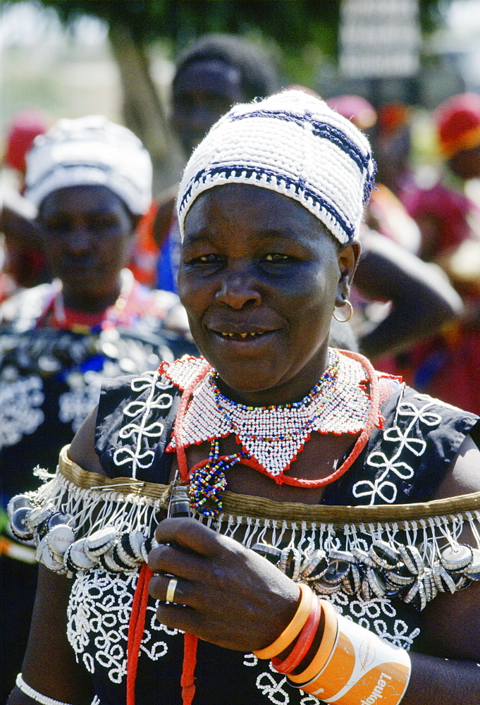 Woman wearing traditional dress, Kenya, Africa