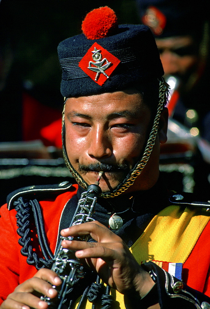 Man plays clarinet in Nepalese Army Band, Nepal