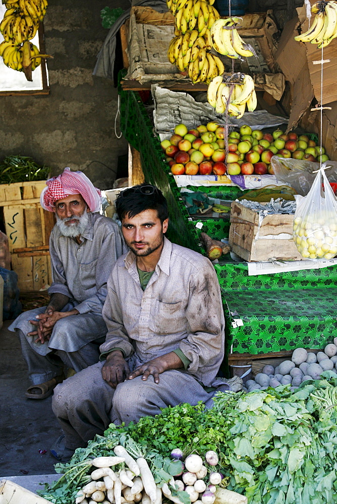 Pakistani fruit and vegetable sellers in village of Pattika, Pakistan