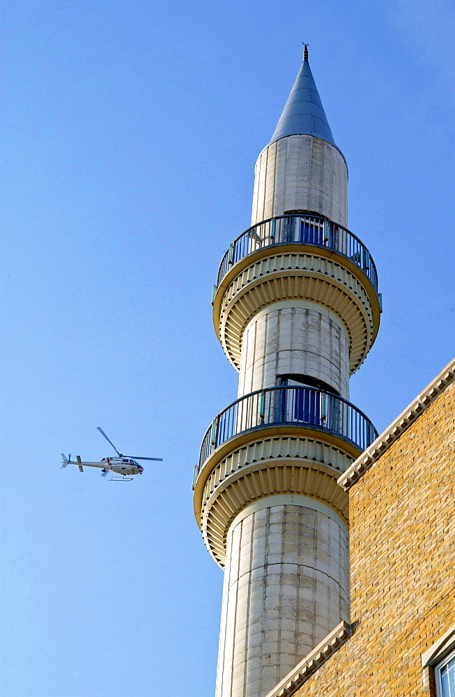 Police Helicopter Circling The Suleymaniye Mosque, A Turkish Islamic Cultural Centre In East London