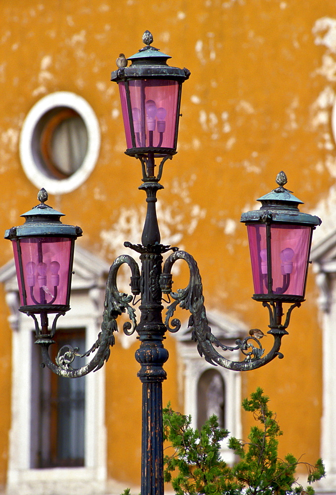 Ornate street lamp in Venice, Italy