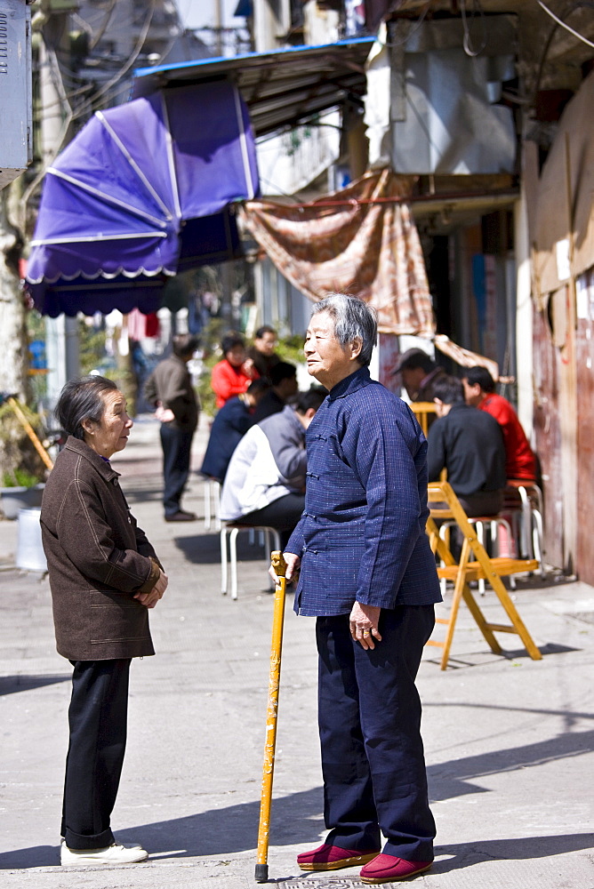 Pensioners in Zi Zhong Road, old French Concession Quarter in Shanghai, China