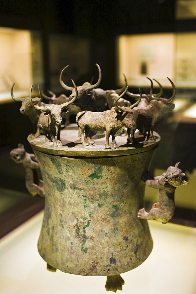 Bronze Han Dynasty cowrie container with yaks and lion decorations, on display in the Shanghai Museum, China