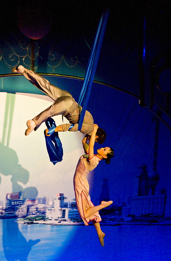 Members of the Shanghai Acrobatic Group performing at the Shanghai Centre Theatre, China