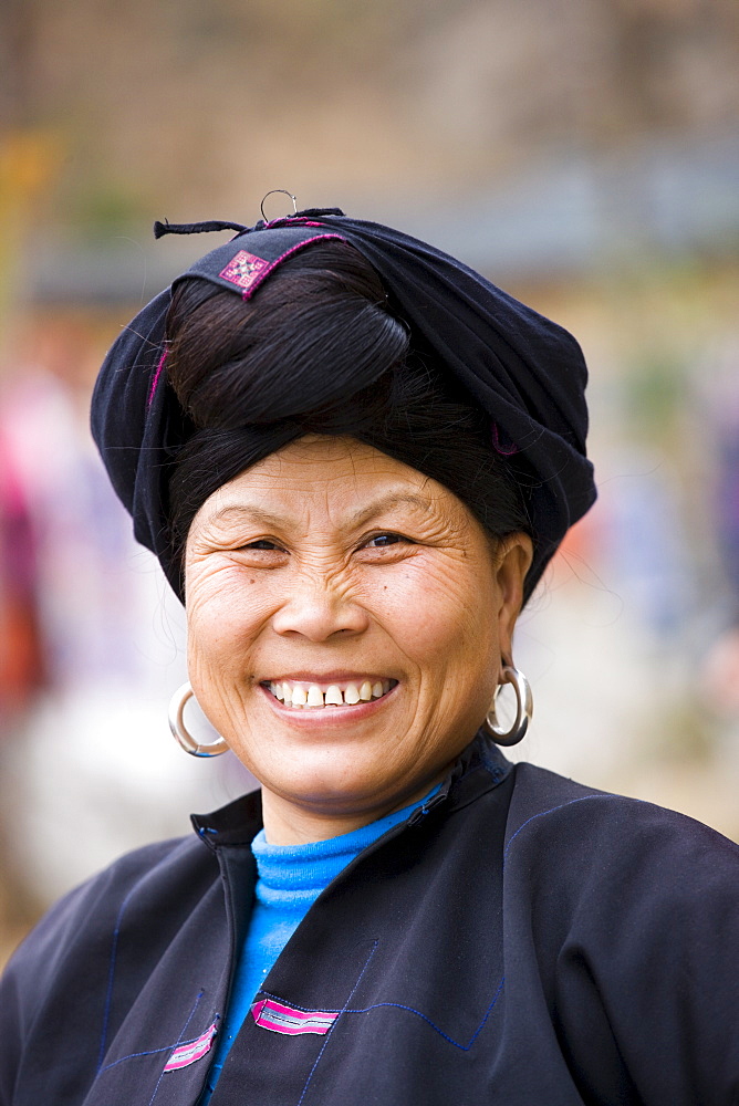 Woman from Yao minority nationality with traditional long hair according to folk custom, Ping An, Guilin, China