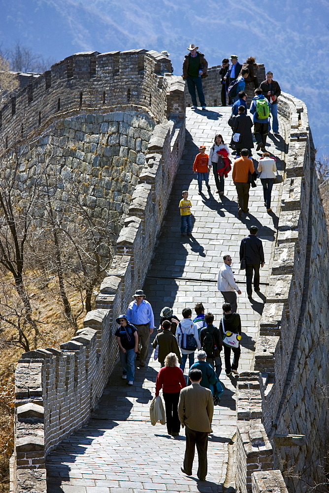 Tourists walk the ancient Great Wall of China at Mutianyu, north of Beijing, China