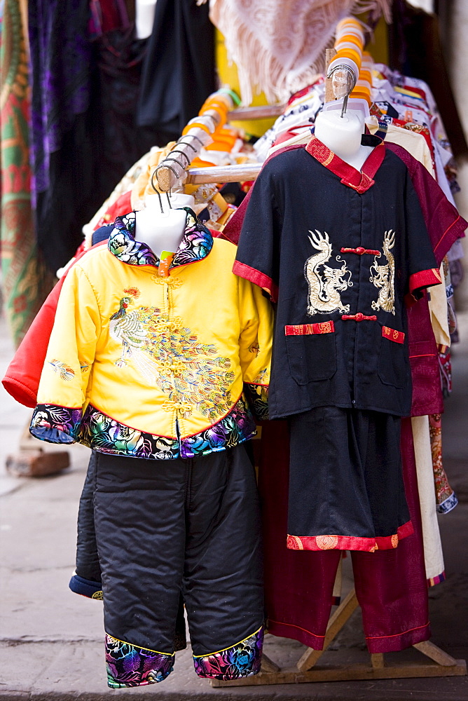 Chinese silk clothes souvenirs on sale near Dazu rock carvings, Mount Baoding, near Chongqing, China