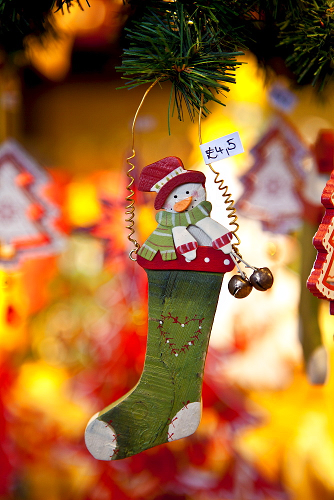 Christmas stocking and snowman ornament at Christmas market, Winter Wonderland, in Hyde Park, London