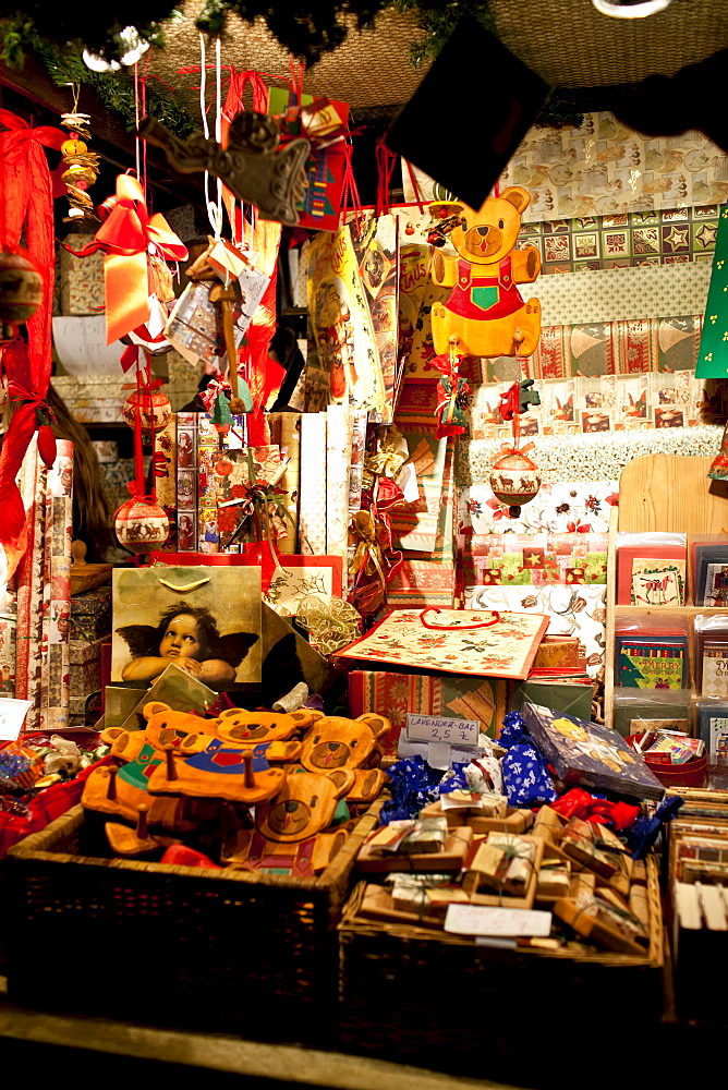 Christmas ornaments and wrapping paper at traditional stall at Christmas market, Winter Wonderland, Hyde Park, London