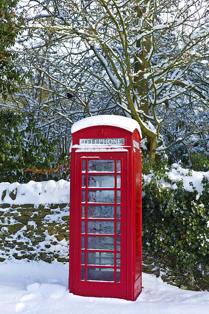 Traditional telephone box in the village of Swinbrook, The Cotwolds