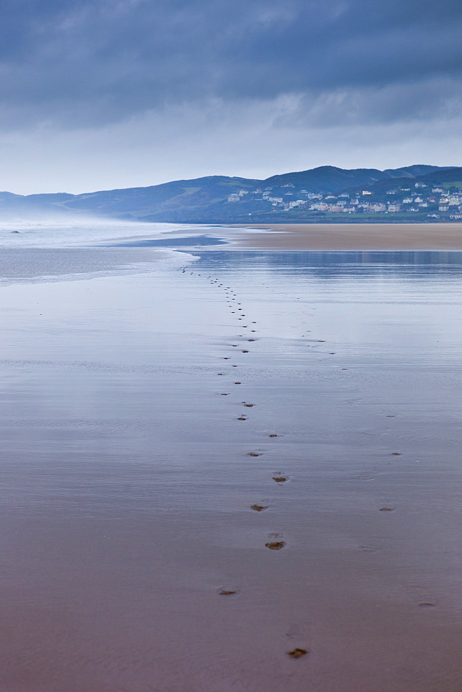 Footprints in the sand at Woolacombe, North Devon, UK