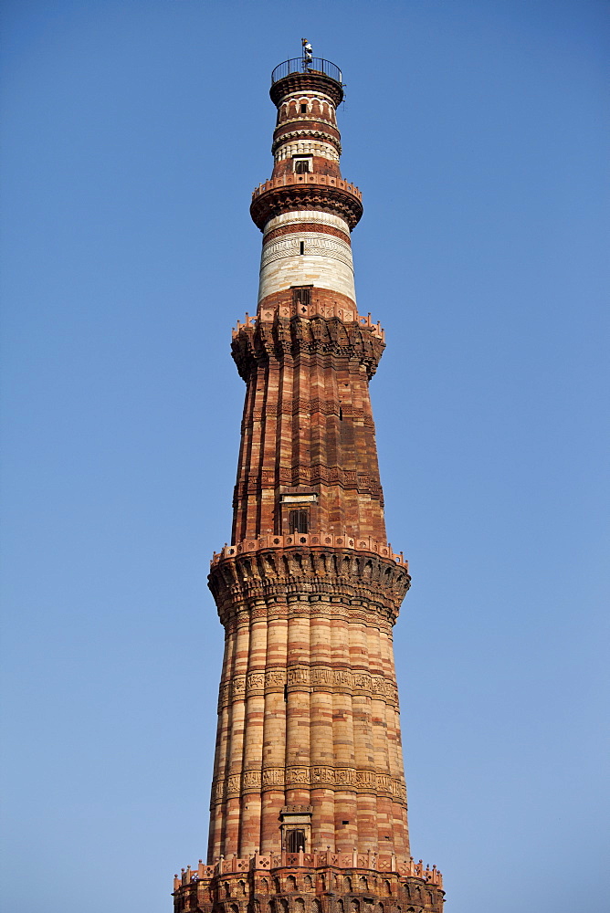 Qutub Minar minaret tower with verses from the Qur'an at Qutab Minar Complex, Unesco World Heritage Site in New Delhi, India