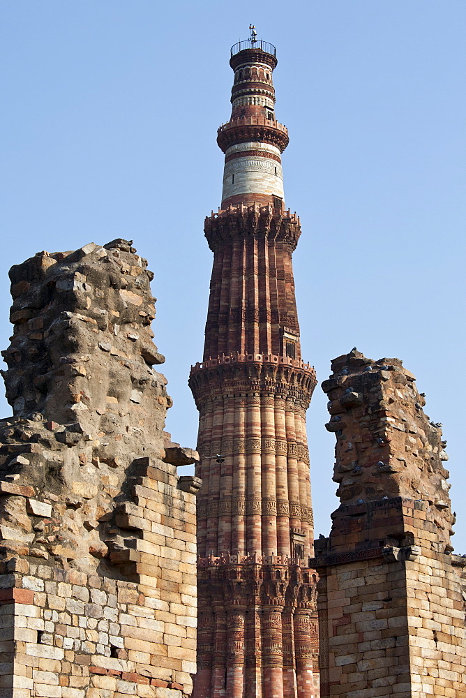 Qutub Minar minaret tower with verses from the Qur'an at Qutab Minar Complex, Unesco World Heritage Site in New Delhi, India