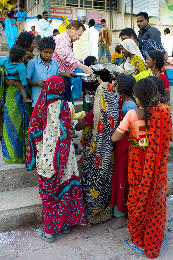 Food aid for the poor at Dashashwamedh Ghat in Holy City of Varanasi, Benares, India