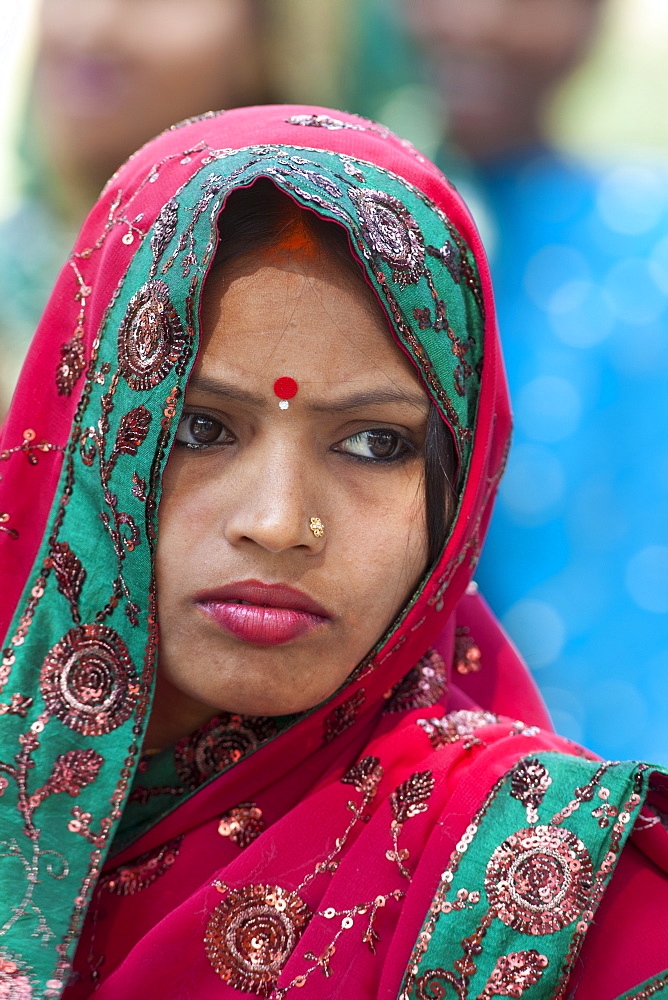 Hindu pilgrim with bindi dot and tilaka mark and nose stud at Vishwanatha Temple (Birla Temple) during Festival of Shivaratri in holy city of Varanasi, India