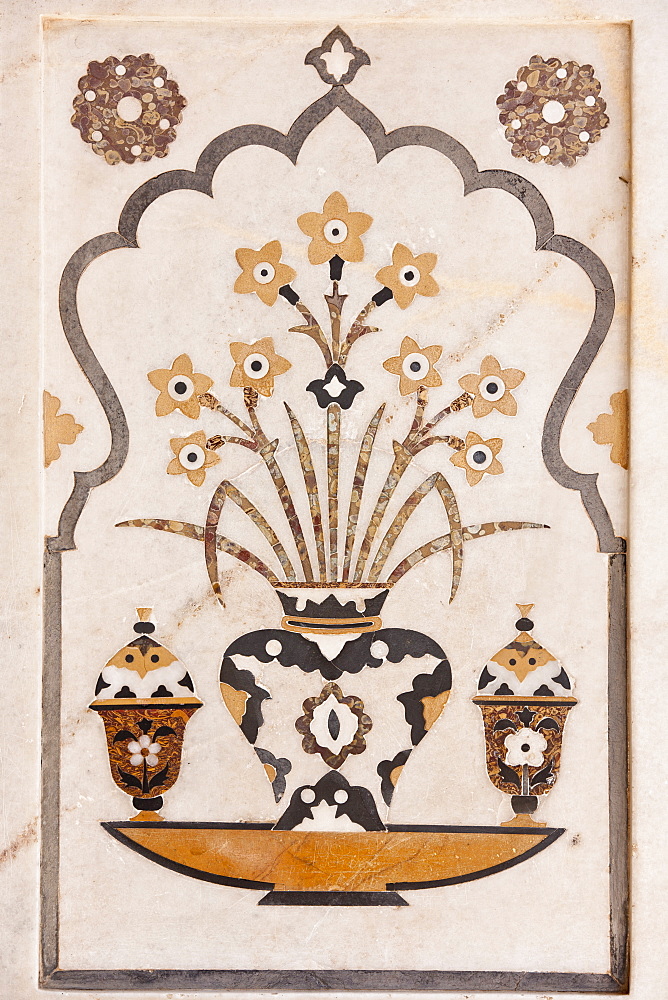 Pietra Dura stone and jewel inlay cut in marble frescoes at Tomb of Etimad Ud Doulah, 17th Century Mughal tomb built 1628, Agra, India