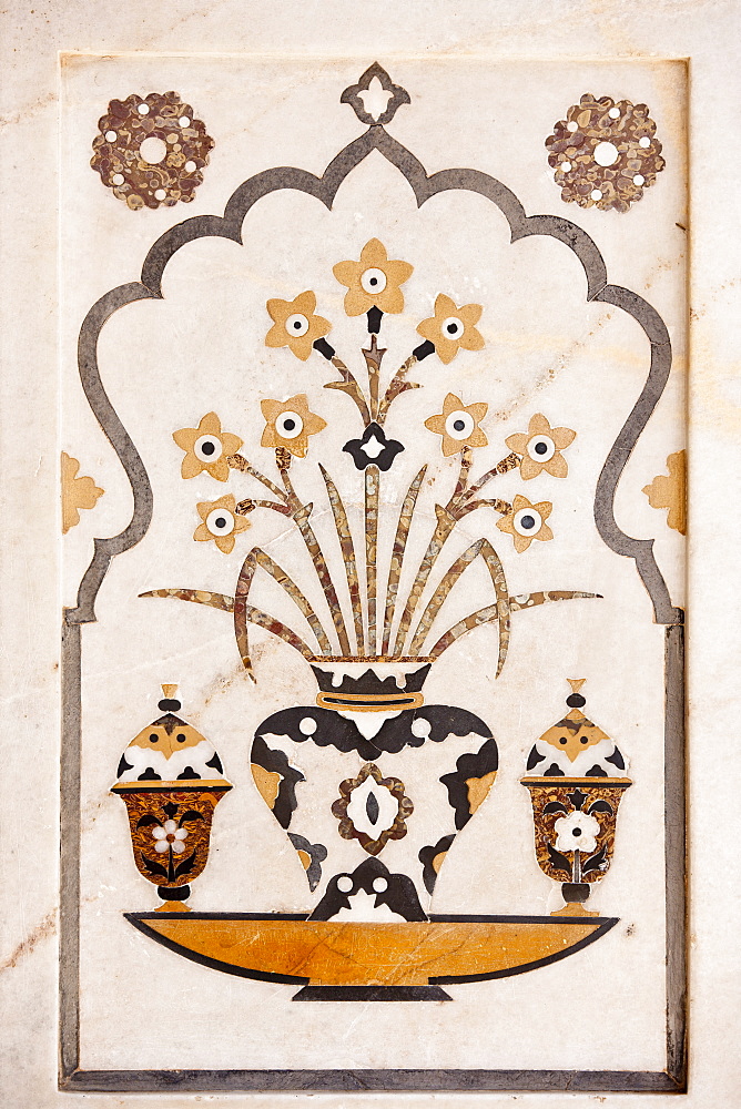 Pietra Dura stone and jewel inlay cut in marble frescoes at Tomb of Etimad Ud Doulah, 17th Century Mughal tomb built 1628, Agra, India