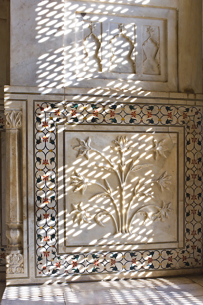 The Taj Mahal mausoleum interior by tombs of Shah Jahan and Mumtaz Mahal , Uttar Pradesh, India