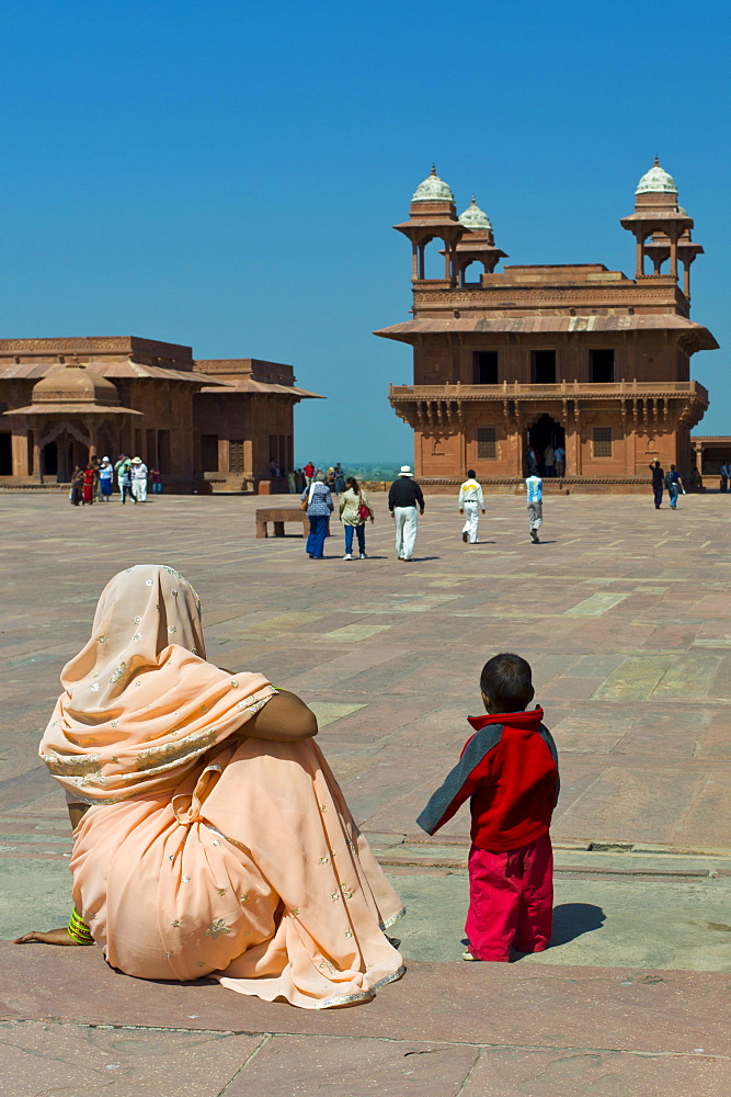 Tourists at Fatehpur Sikri 17th Century historic palace and city of Mughals, UNESCO World Heritage Site at Agra, Northern India