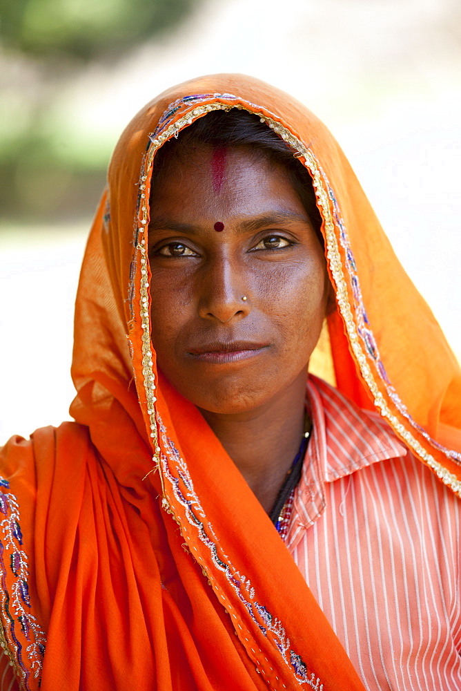 Indian woman villager at farm smallholding at Sawai Madhopur near Ranthambore in Rajasthan, Northern India