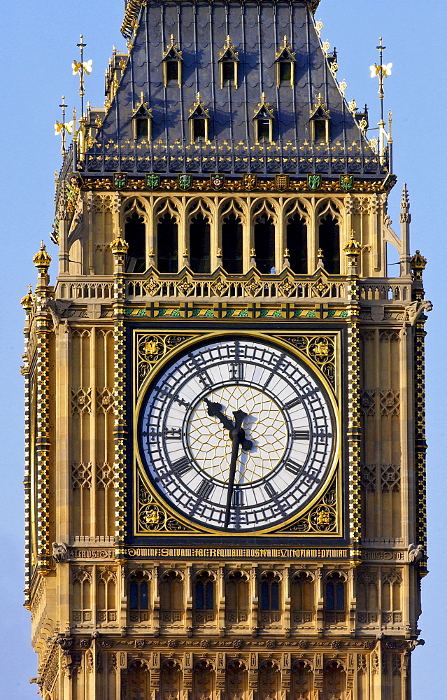 St Stephen's Tower on the Houses of the Parliament which houses Big Ben, the famous clock bells. The great clock of Westminster shows a time of ten thirty (half past ten).