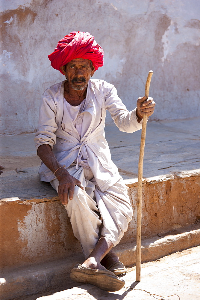 Indian man wearing traditional clothing and Rajasthani turban in village of Nimaj, Rajasthan, Northern India