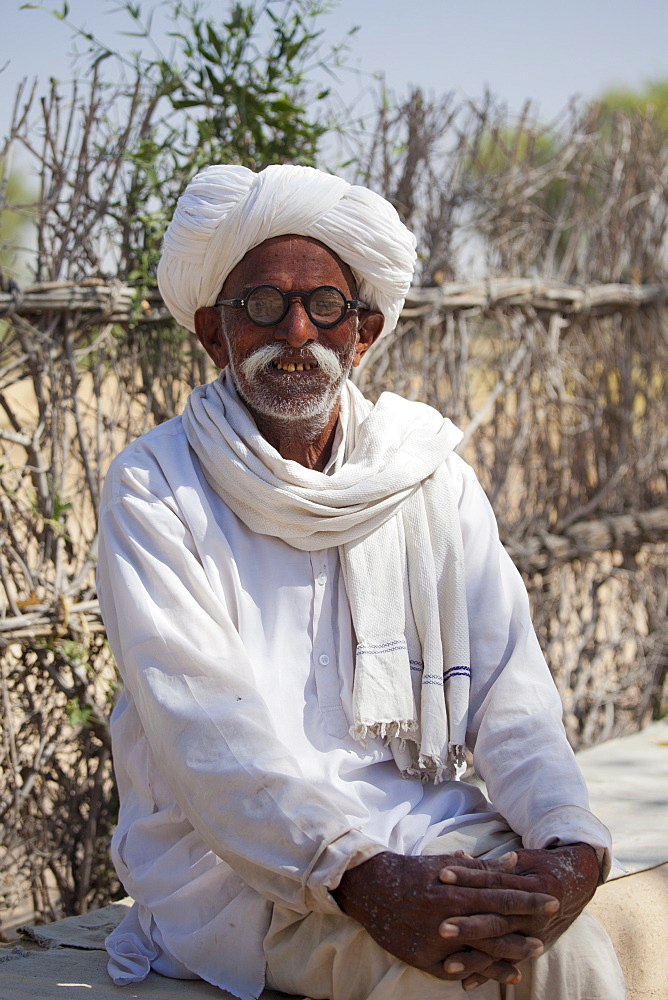 Indian Bishnoi man at Bishnoi village near Rohet in Rajasthan, Northern India