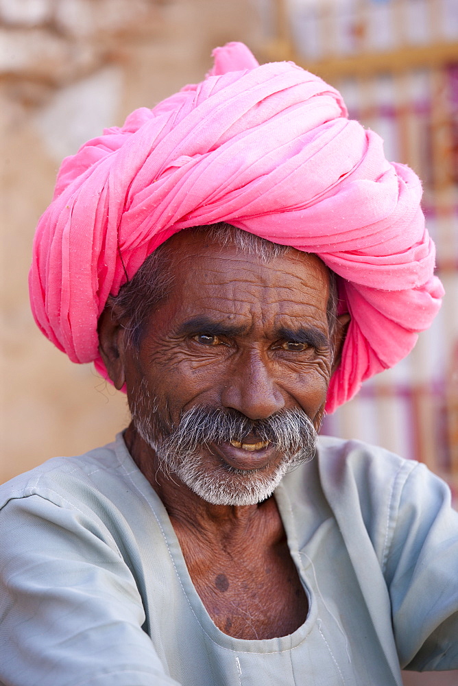 Indian man with traditional Rajasthani turban in Narlai village in Rajasthan, Northern India