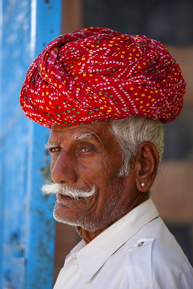 Indian man with traditional Rajasthani turban in Narlai village in Rajasthan, Northern India