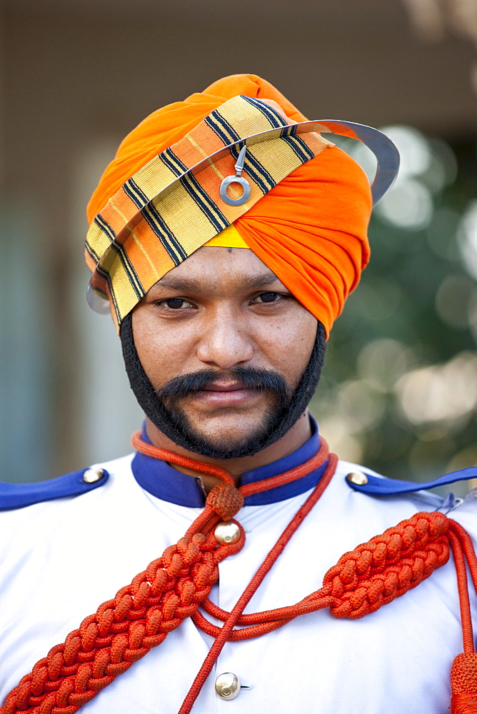 Military musician of 76th Maharana of Mewar, His Highness, Shriji Arvind Singh Mewar of Udaipur, at the City Palace, Rajasthan, India