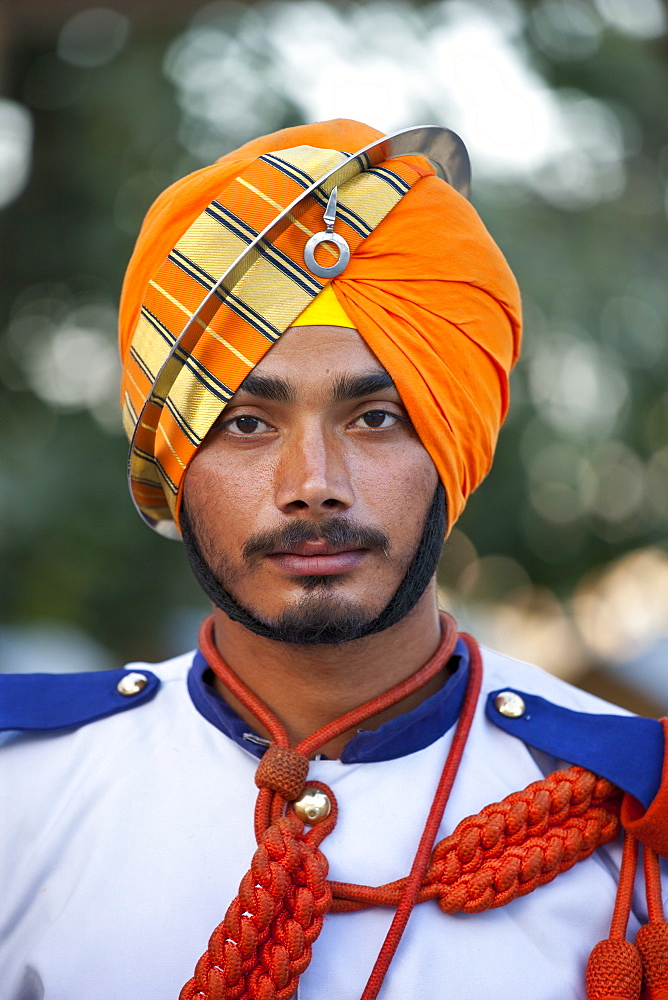 Military musician of 76th Maharana of Mewar, His Highness, Shriji Arvind Singh Mewar of Udaipur, at the City Palace, Rajasthan, India