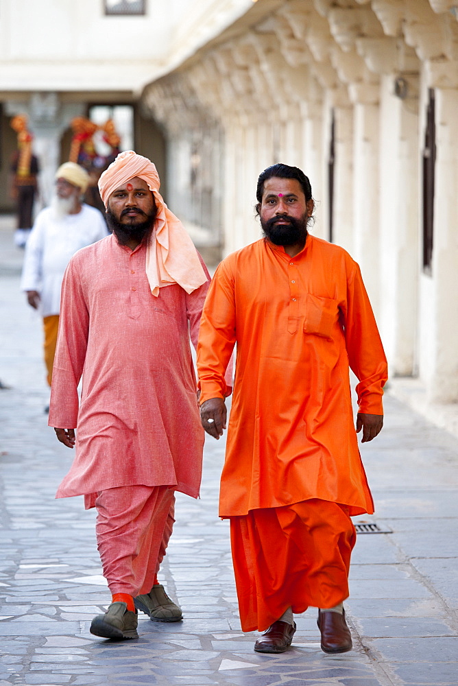 Hindu priests at Holi festival of 76th Maharana of Mewar, His Highness, Shriji Arvind Singh Mewar of Udaipur, at the City Palace, Rajasthan, India