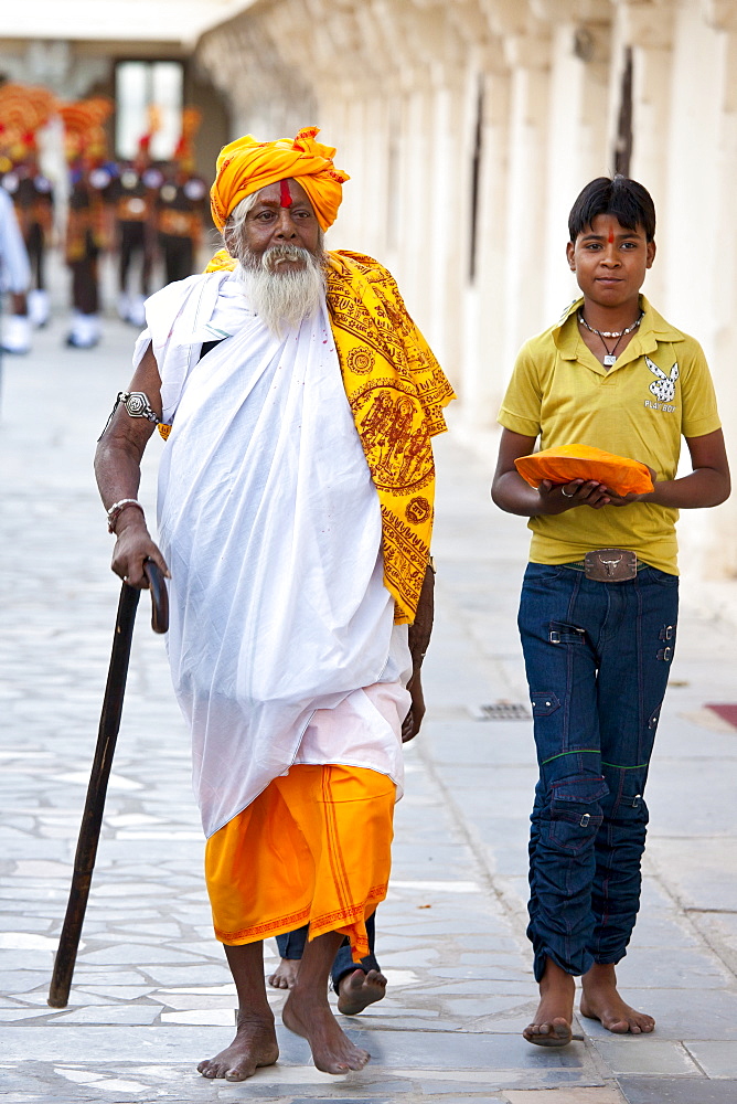 Hindu priest at Holi festival of 76th Maharana of Mewar, His Highness, Shriji Arvind Singh Mewar of Udaipur, at the City Palace, Rajasthan, India