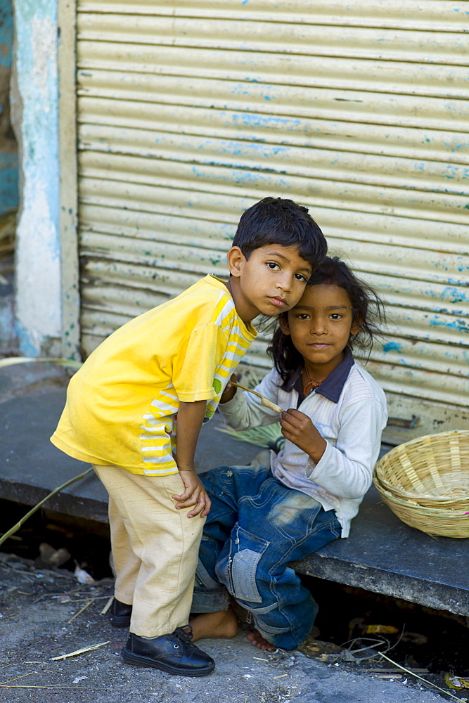 Indian children in the street in old town Udaipur, Rajasthan, Western India