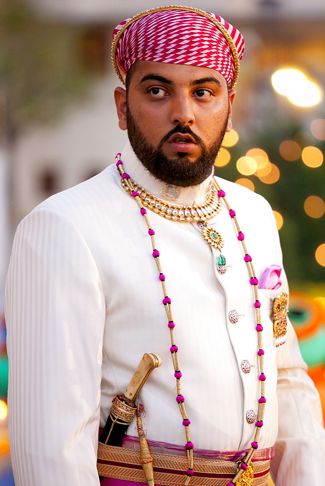 Lakshaya Raj, son and heir of 76th Maharana of Mewar, Shriji Arvind Singh Mewar of Udaipur, at Holi Festival at the City Palace, Rajasthan, India