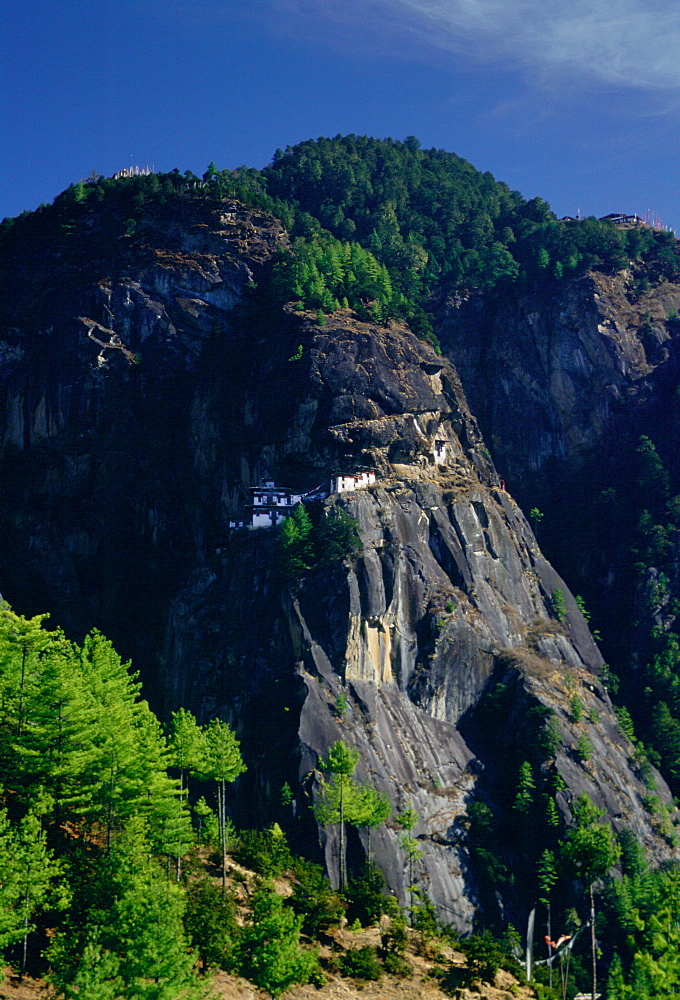 The Tak Tsang (Tiger's Nest) Buddhist monastery nestled on the granite cliffs above Paro, Bhutan.