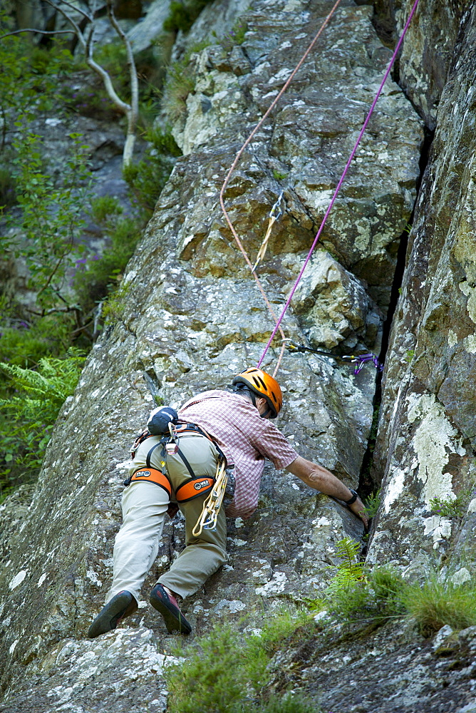 Rock climbing, free climbing on Black Crag, in the Lake District National Park, Cumbria, UK