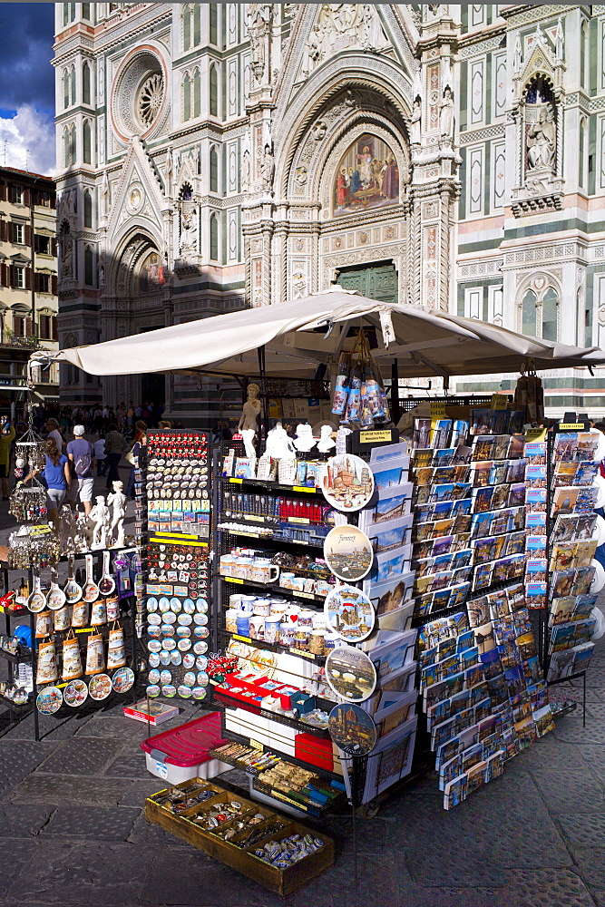 Souvenir stall selling guidebooks, maps and souvenirs in Piazza di San Giovanni, Tuscany, Italy