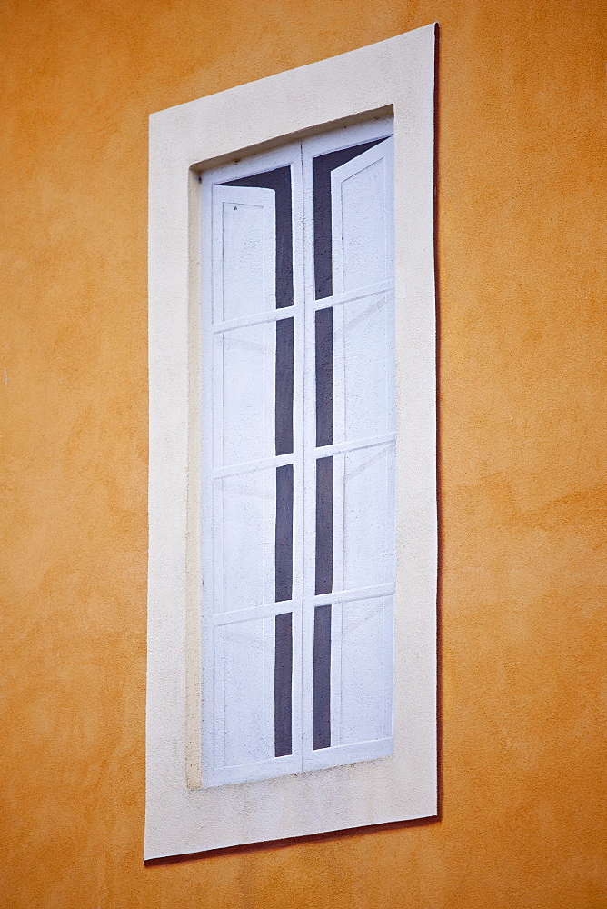 Trompe L'oeil painted effect of a window in Costa di Piazza Garibaldi in old hill town of Montalcino in Val D'Orcia, Tuscany, Italy