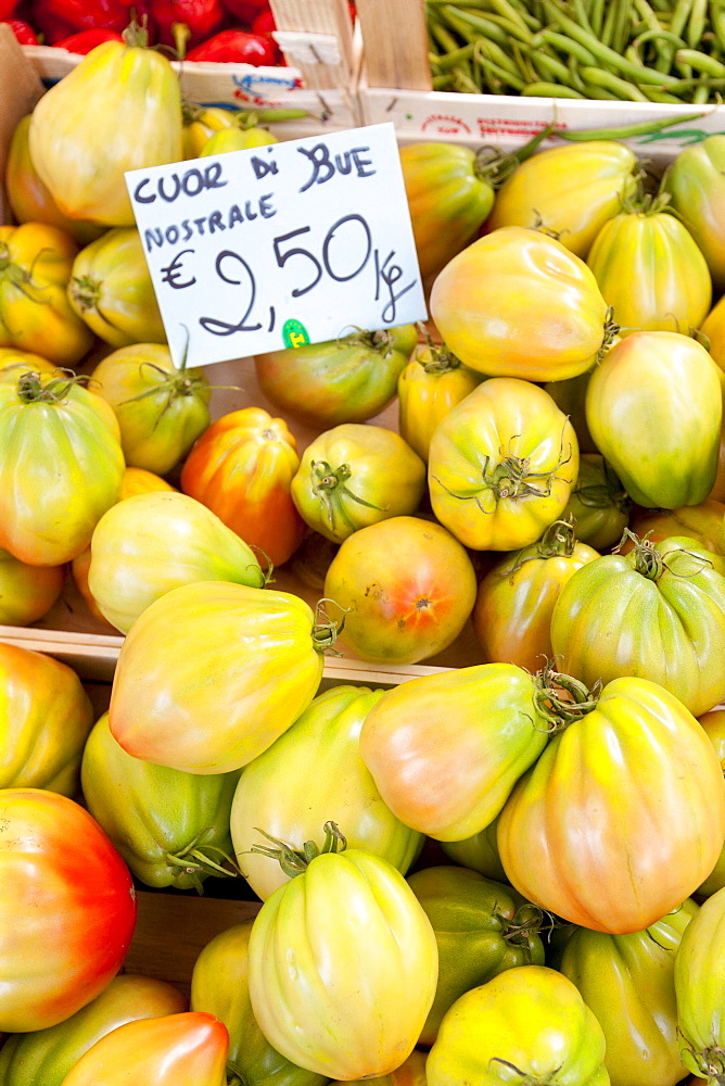 Fresh tomatoes, cuor di bue nostrale, on sale at weekly street market in Panzano-in-Chianti, Tuscany, Italy