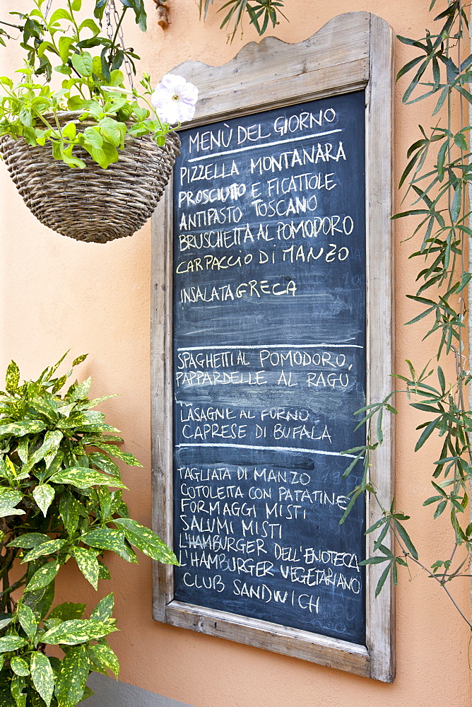 Chalkboard menu for restaurant Enoteca Baldi in Piazza Bucciarelli, Panzano-in-Chianti, Tuscany, Italy