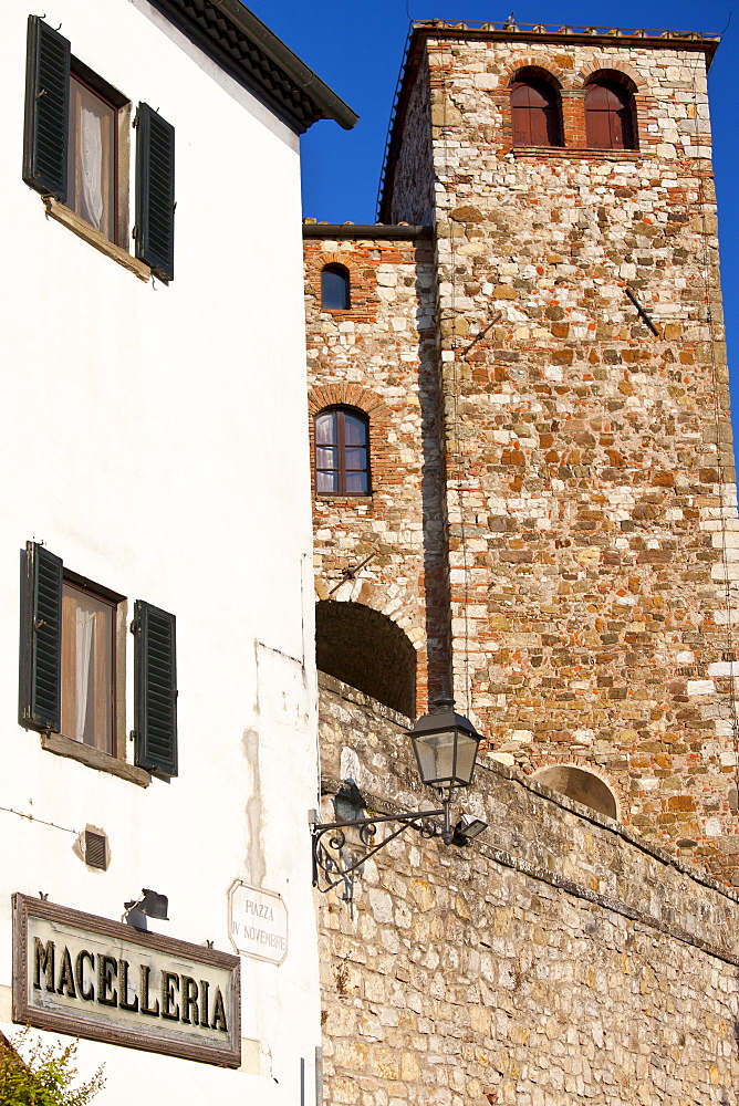 Macelleria and ancient fortification in via Roma in Radda-in-Chianti, Tuscany, Italy