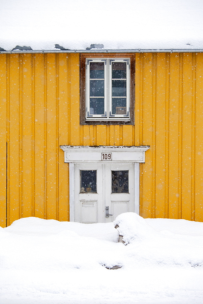 Traditional wooden buildings along Storgata in the quaint area of Tromso, in the Arctic Circle in Northern Norway