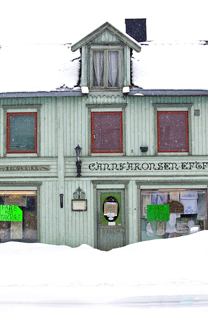 Traditional wooden buildings along Storgata in the quaint area of Tromso, in the Arctic Circle in Northern Norway