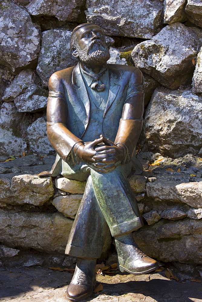 Bronze statue of famous architect Antoni Gaudi 1852 to 1926 at El Capricho de Gaudi at Comillas in Cantabria, Spain