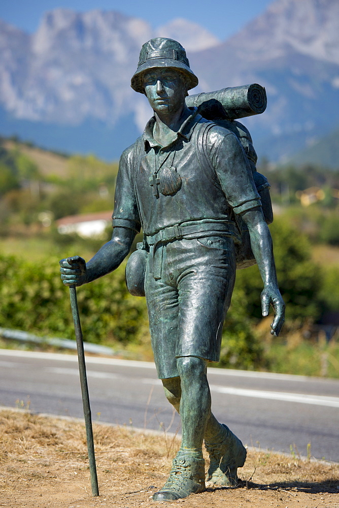 Hiker bronze statue on Pilgrim's Way at Potes in Picos de Europa, Asturias, Northern Spain