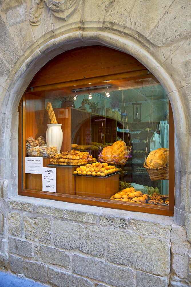 Food shop selling artisan bread and cakes in Calle Major in town of Laguardia, Rioja-Alavesa, Basque country, Spain