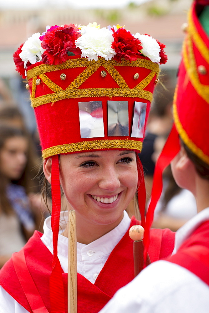 Dancer in procession through the streets during San Fermin Fiesta at Pamplona, Navarre, Northern Spain