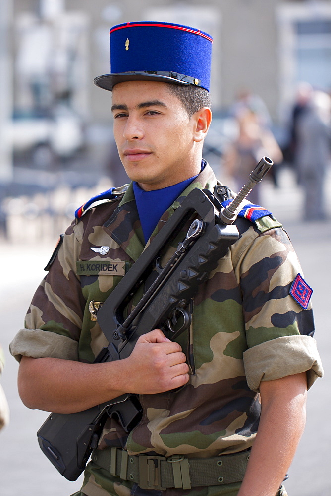 Soldier in the French military attending parade in Pau in the Pyrenees, France