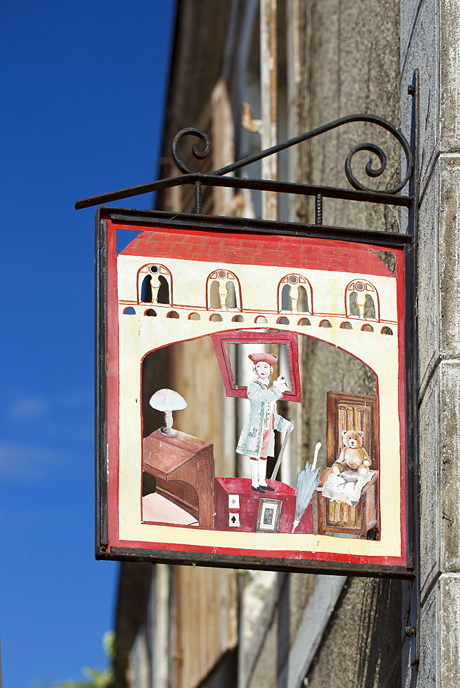 Traditional sign for shop in Parce-Sur-Sarthe, France